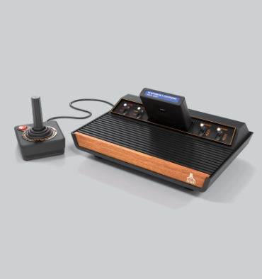 32. Atari 2600 Console and Games